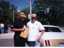 This pic was taken in 1997 at the Oldsmobile Nationals in Lansing Michigan.  This was the first time I met Doc Watson, he also signed my trunk, on my Olds that is.