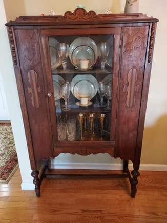 Antique china cabinet with Mom's fine china