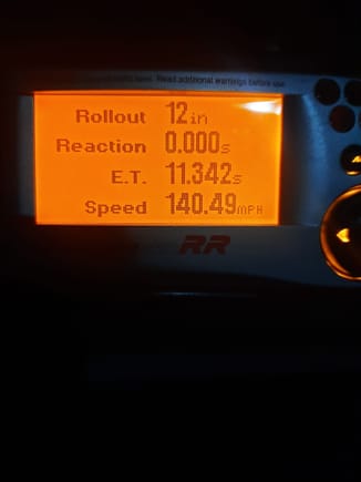 1/4 mile on brand new 295/50 street tires and just basic cement. This is STILL being hampered by severe traction issues during launch efforts. So so ET, but decent mile an hour on the big end. Need some slicks and a sticky track to really hook this thing up, but at least I can get some readings now, as all it would do before is just blow the tires off well into 3rd gear skating all over the place. 