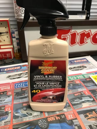 I use this cleaning conditioner and it works great. If you have the wheel off the car than put it on top of some newspaper, spray it down and let it soak for a few hours. Then use a soft cloth or paper towel and wipe it down. Works awesome and dry to the touch with no film. You may want to do it a few times.