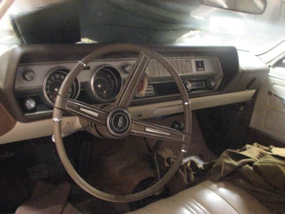 Green Car - Steering Wheel and Dash handcuffs around the 4 speed shifter.