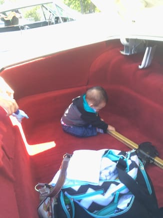 The well-finished trunk served as a playpen for my grandson at a local car show.