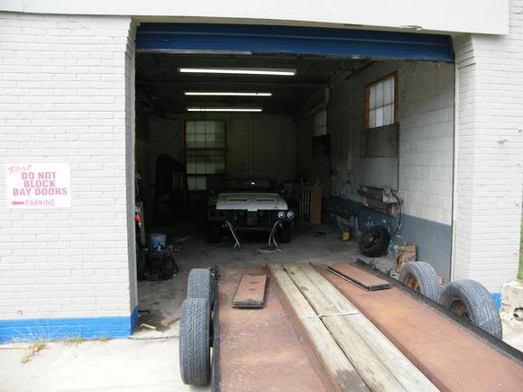 Wife says, &quot;find somewhere away from house to work on it. So I found a bay at the old Ford Dealership (I know: sacrilige)
to work on it.