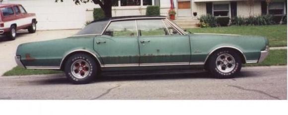 '67 Cutlass side

The Green Banana! This is the only car I ever took to 120 miles per hour...my brother behind me in his Eagle Talon said that flames were shooting out of the exhaust.