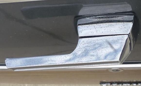 Pinprick damage on tailgate handle