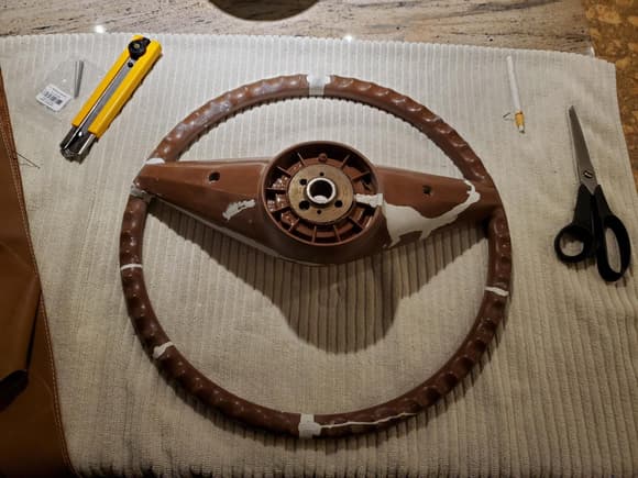 Sand everything smooth. It does not need to be perfect as if it was going to be painted, but it should have smooth transitions to the plastic of the wheel.