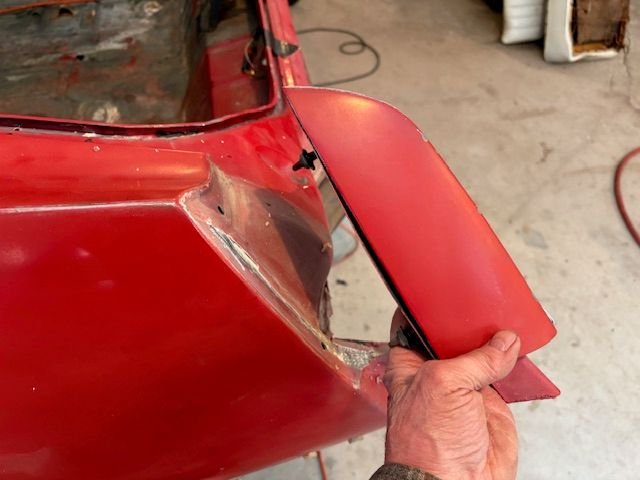The die cast end piece is attached with two stud anchors and speed nuts.  Came off easily