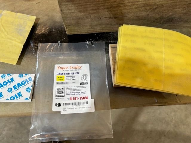 The chemical adhesion window for paint over the epoxy is three days.  I was about ready to say What the Heck and just clean and paint it without any scuff.  But I had bought these 800 grit hook and loop abrasive sheets.  I am kinda easy prey for people selling new stuff sometimes.  Super Assilex is what these are called.  4 sheets and a foam backer.  $36 is kinda pricy 