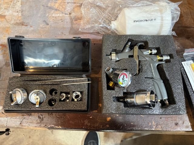 This is what you get for about $100 if you buy the  Inokraft.  The kit comes with three different air caps and needles, so it will handle almost any paint consistency.  I intended to use it for high-build primer surfacer.  Have not got there yet, so have not tried it.