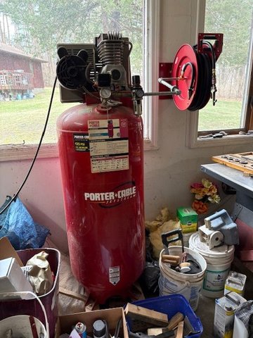 2 cylinder 220 volt compressor is big enough for what I do.  Hose reel is really nice.  Air filter is barely adequate.  It gets most of the moisture, but not all of it. 