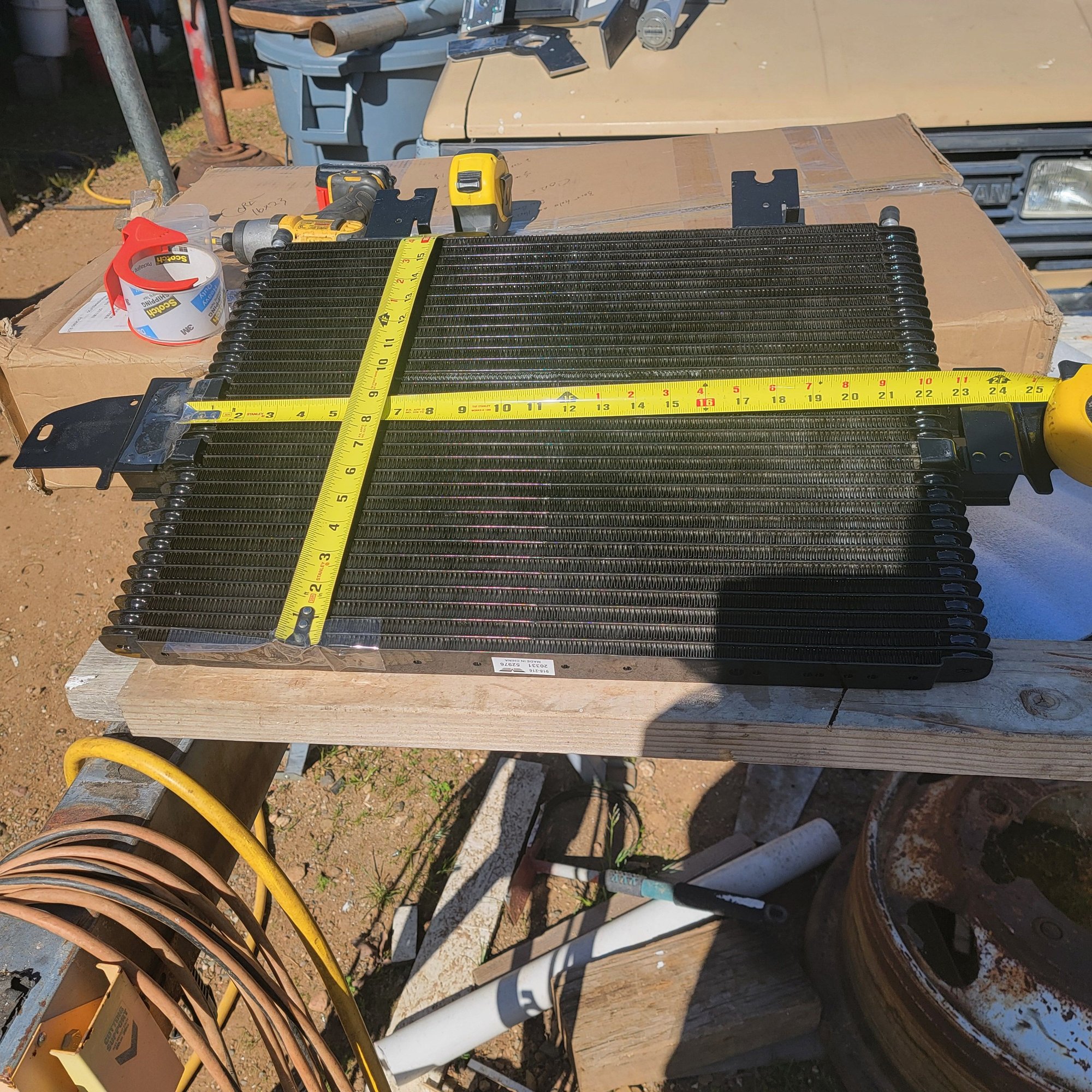 its 17x23 and uses barbed connections, I was hoping to use hardline from Transmission to the cooler. It will depend on how much vibration and movement between the tranny and cooler. If its a short distance like crossing to the frame, then I would use a crimped on hose. If the tranny will move more than a 1/4 in then it will probably need a flexible join.