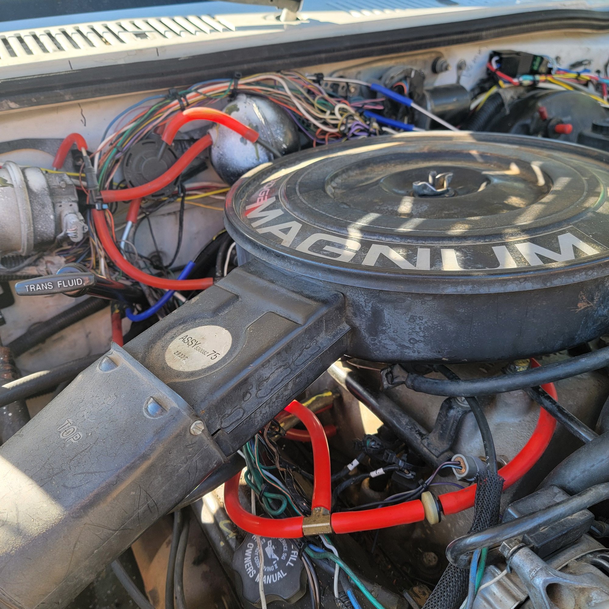 The red hoses will make it run more better and the rats nest
