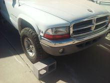 Slight dent in the fender.. can be fixed later with paintless dent removal.