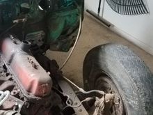 Driver side fender off. I had to cut almost half the bolts out. 