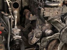 Don’t have the equipment to drain the a/c properly so I unbolted it and pushed it to the side. Is a bit difficult to work around it but it’s possible.