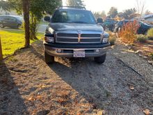 I got the bumper on and sitting where I like it. The wife is happy as I no longer have the junkiest truck on the street. Doing this really showed me how bent the grill was, I have a large gap between the grill and bumper. Add it to the list. 