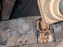 Broken part on top of fuel tank