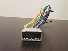 Fits my Dakota, but provides no power, also has 2 yellow/contant wires