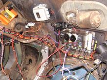 This side is a little better. Ignore the big red wire. That is me finding out Im an idiot and didnt ground the starter relay. Oops. 
