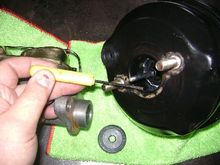 Booster hole is 31/32" deep without the gasket.
