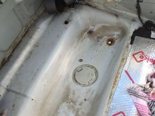 To my surprise, not much rust under the rear seat cubby.