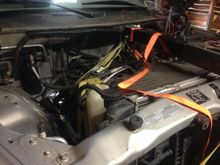 Engine securely supported by 2 heavy duty ratcheting tie downs. As well as front end.