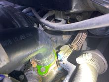 Empty hole right above the leaking thermostat 