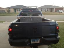 Rear,tinted tail lights. Plasti Dip bumper and Lettering.