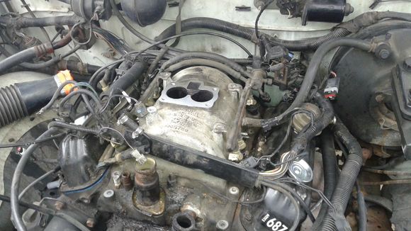 Manifold as is. All 12 bolts removed