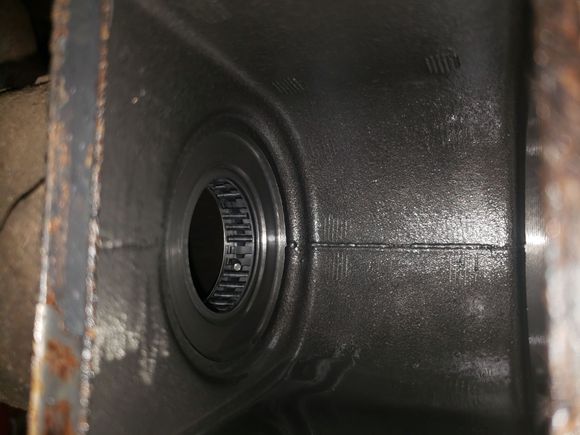 The old bearing in place. Note one roller already trying to escape. 