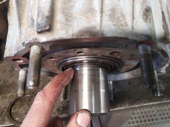 If you don't do these mods or use the correct piece this snap ring groove will be buried within the bearing 5/16" back and your entire mainshaft will sit 5/16" too far to the rear -- not sure the case halves would even mate this way but I wasn't gonna find out