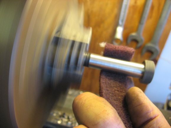 Polishing mounting bolt where it makes contact with bushing.