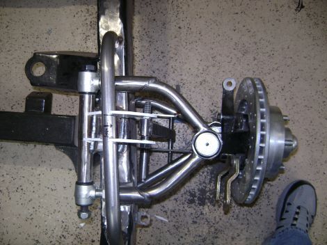 This is tricky. The shock mounts need to be straight, but the frame and upper bar are not. I think it looks pretty good. 