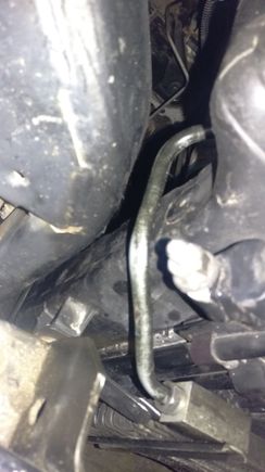 This is the small 12 inch factory tube that goes from the inside radiator oil cooler point back around the side to the from added oil cooler.