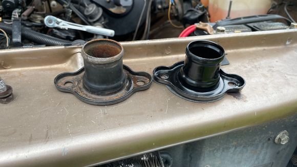 Old/New Thermostat Housing/Water Outlet