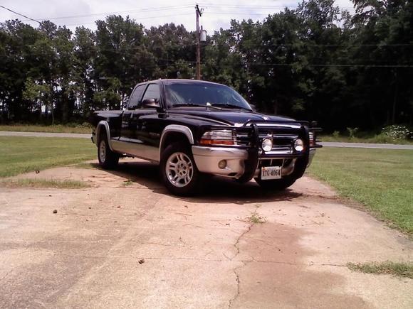 pic of truck with previous wheels and the side light guard on truck before they had to come off because  of inspections (apparently they are illegal in VA, dumb commonwealth laws)