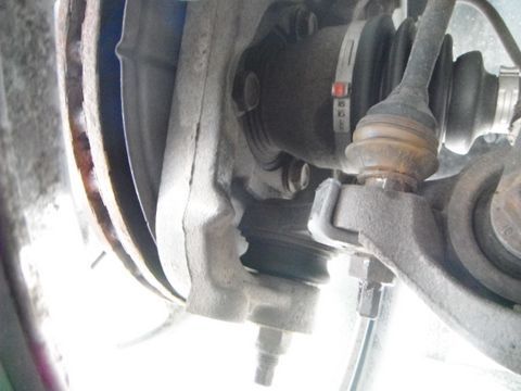 The tires rubbed on the frame a bit so I added a simple steering stop.
The sway bar bolt holds a piece of 3/16 flat bar bent up to add 3/16 to the steering stops. Cant tell the difference in turning radius but tires don't rub anymore.