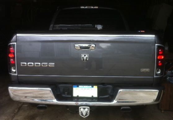 Nice Tail Lights.  Cat-back dual exhaust.  That hitch cover does get removed when I trailer my Harley.