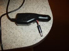 This is the modded charger that came with my gps. I decided to attach it to a plug for easy removal if needed.