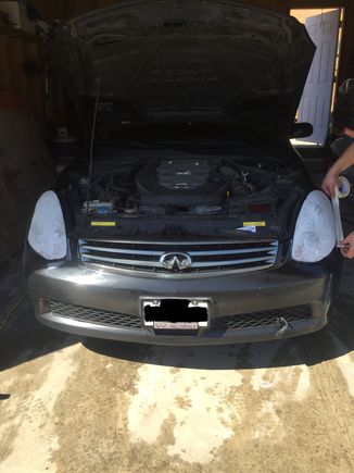 Attempting to polish headlights with the good ol' toothpaste trick.. Never try this with a buffing machine you'll end up coasting yourself a new set of headlights.