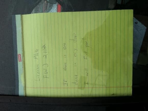 Some douche bag left this on his passenger side window , haters ...