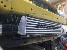 View of intercooler mounted on bumper support (with bumper support mounted on the radiator support)