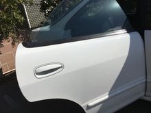 Acura Integra 
Right Rear Door 
Sedan 94-01
Original Frost White paint (94-98 white)
$100
Includes door shell, both hinges, weather stripping, glass, regulator, exterior moldings, door latch and wiring harness.
Exterior handle is sold