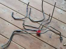 Used the original fittings and made my own new lines out of steel brake line.