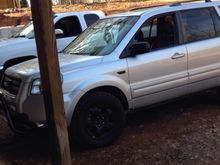 This is how it sits next to my friend's 2in leveled Silverado on 35in Trail Grapplers.