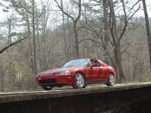 I drive over a 35 foot wooden bridge to reach the civilized world.