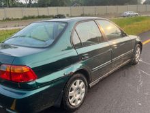 Right after the accident happened. Show damage to the rear quarter panel pretty well and also a bit to the rear right door