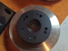 oem rotors, as I am sure you guys know the hats do not come painted from Honda on these rotors, so I sent them out and had the hats powder coated flat black.