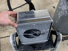 Speed factory race radiator. Have both an ends thermostat and water neck for the ls motor also. 