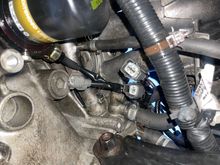 Picture from the underside of what I have unplugged, o2 sensor, reverse light, and speed sensor(?) not sure about that one.